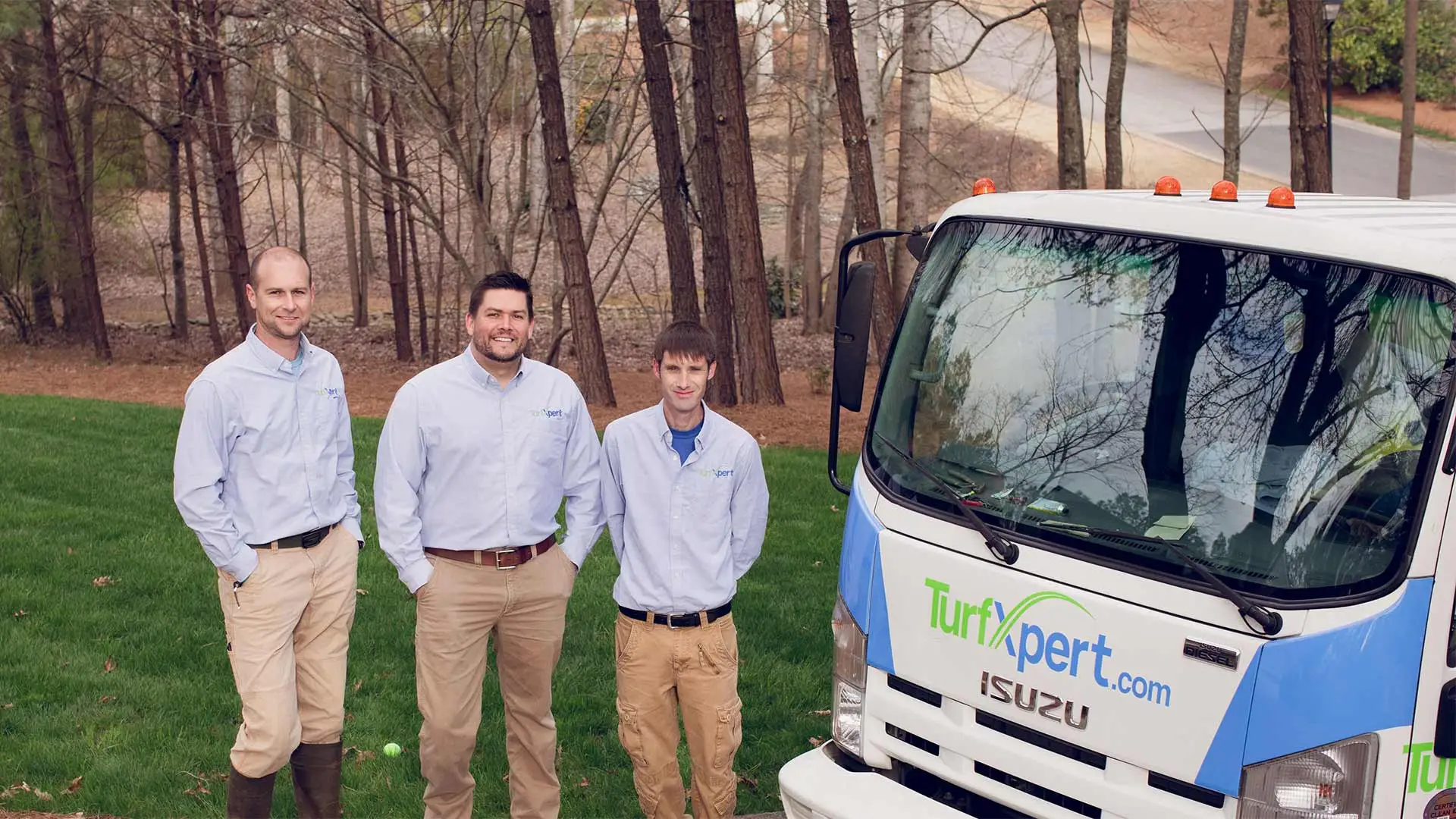 TurfXpert staff after performing lawn care for a Marietta, GA property.